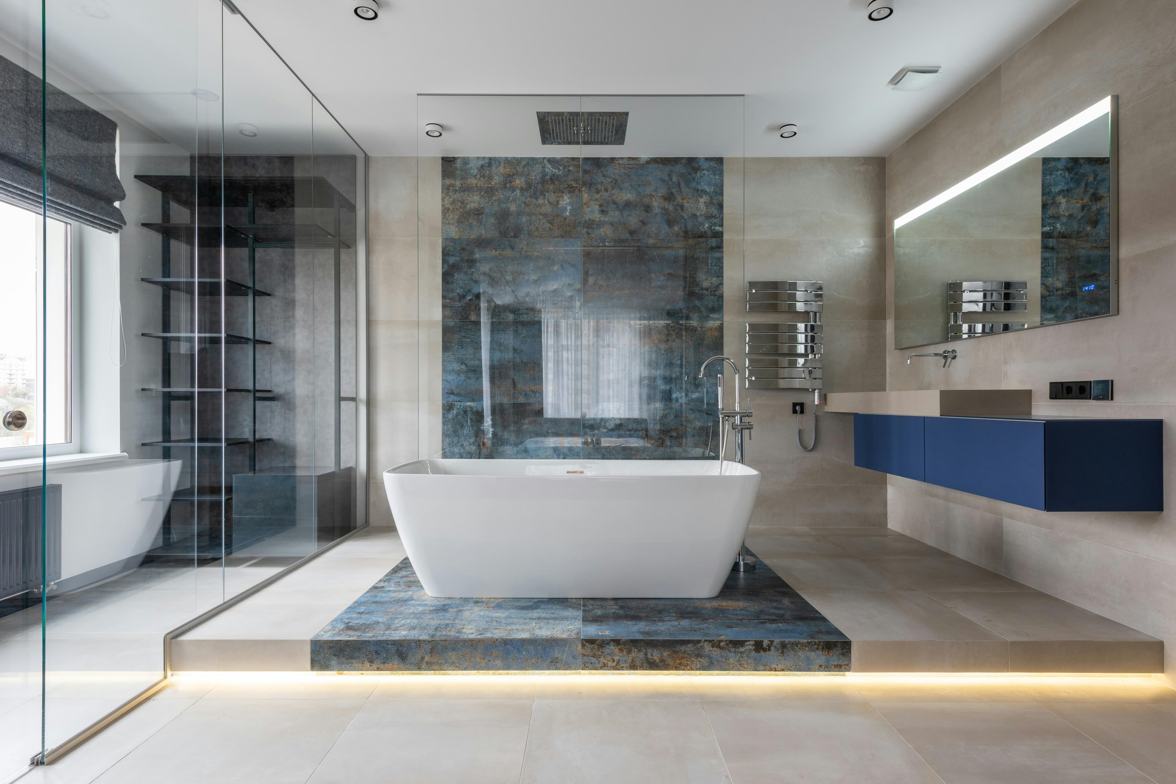 Spa-inspired bathroom with freestanding tub and stone tile