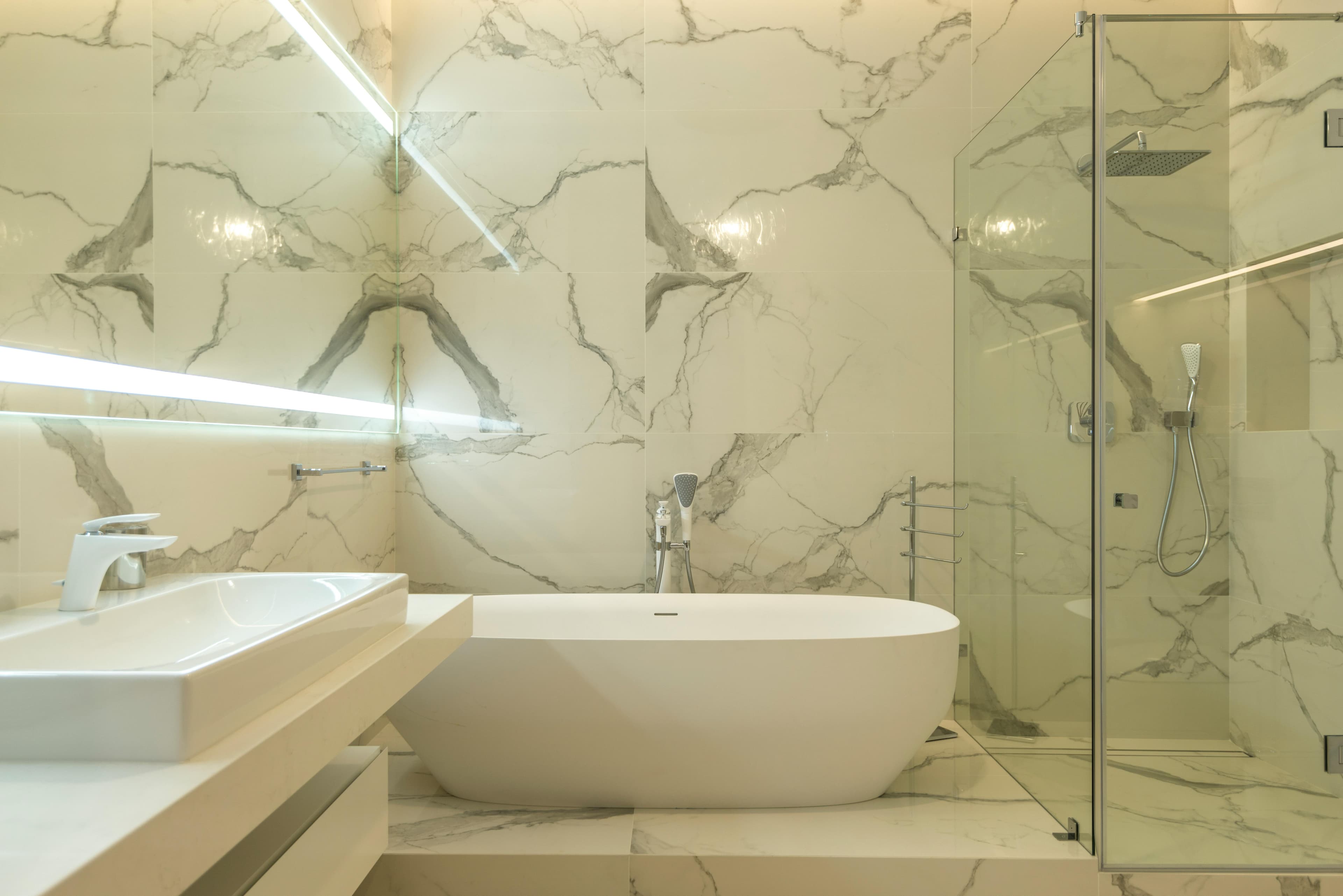 Modern walk-in shower with glass enclosure