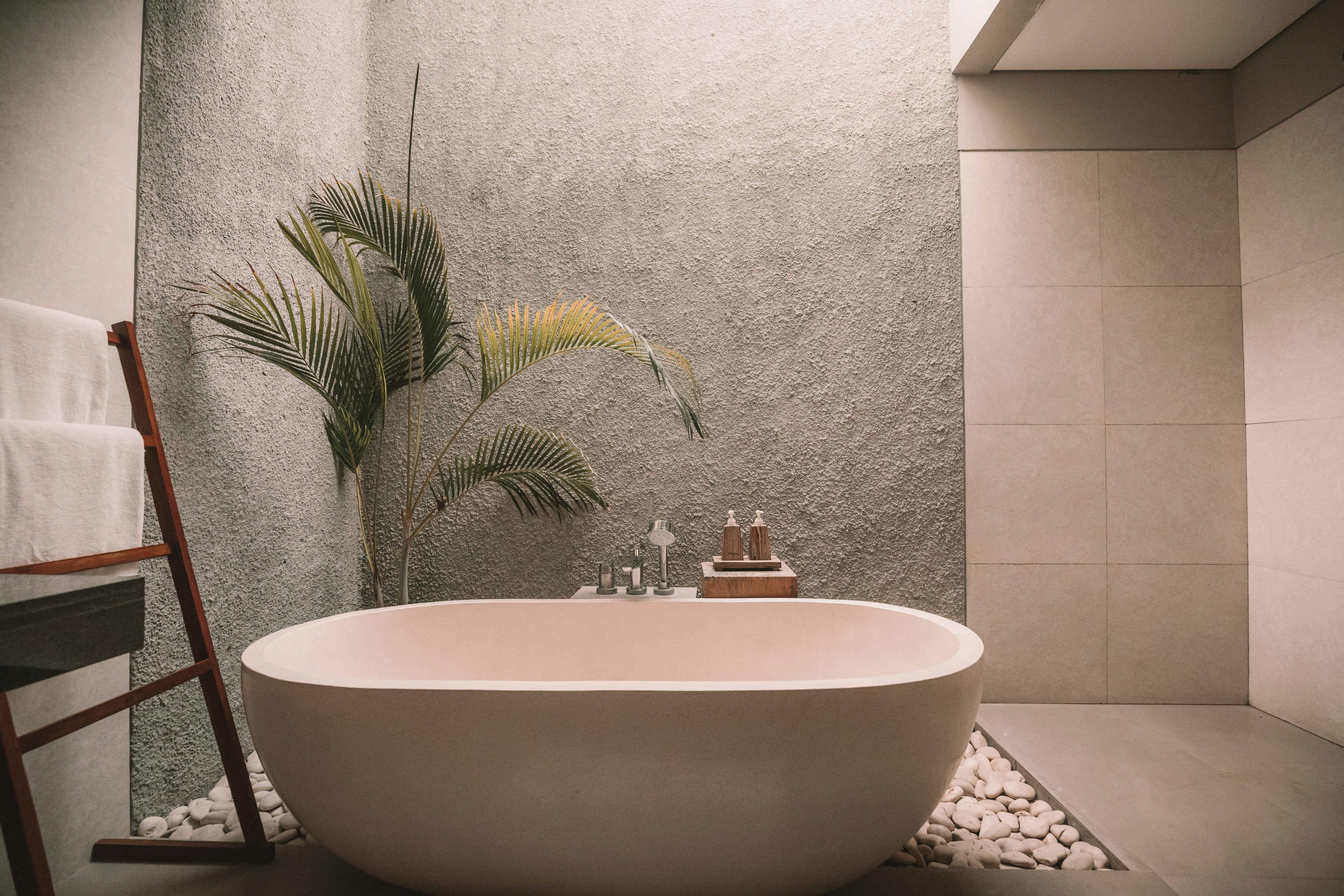 Freestanding soaking bathtub in luxury bathroom