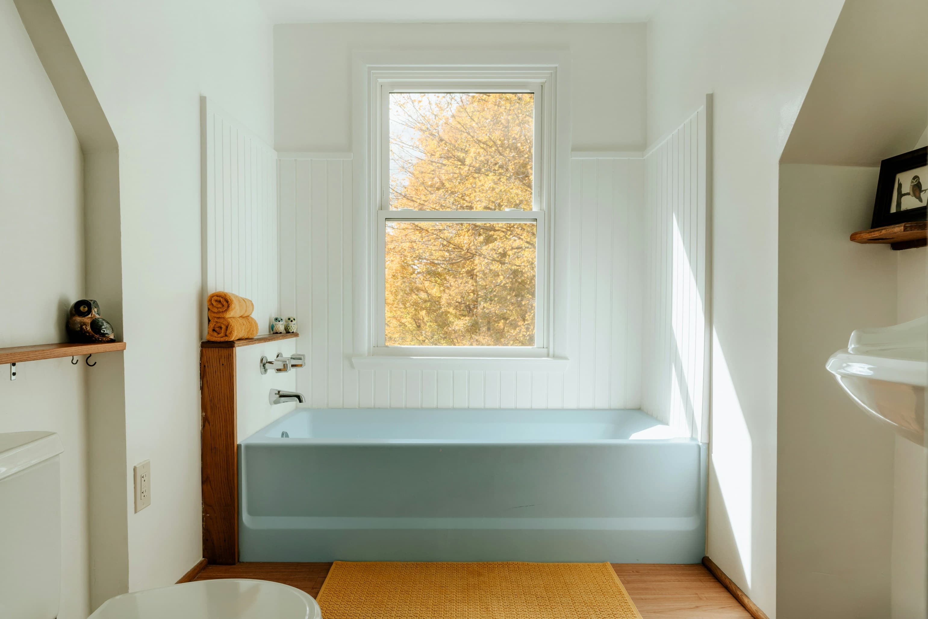 Small bathroom with soothing natural colors and soft lighting