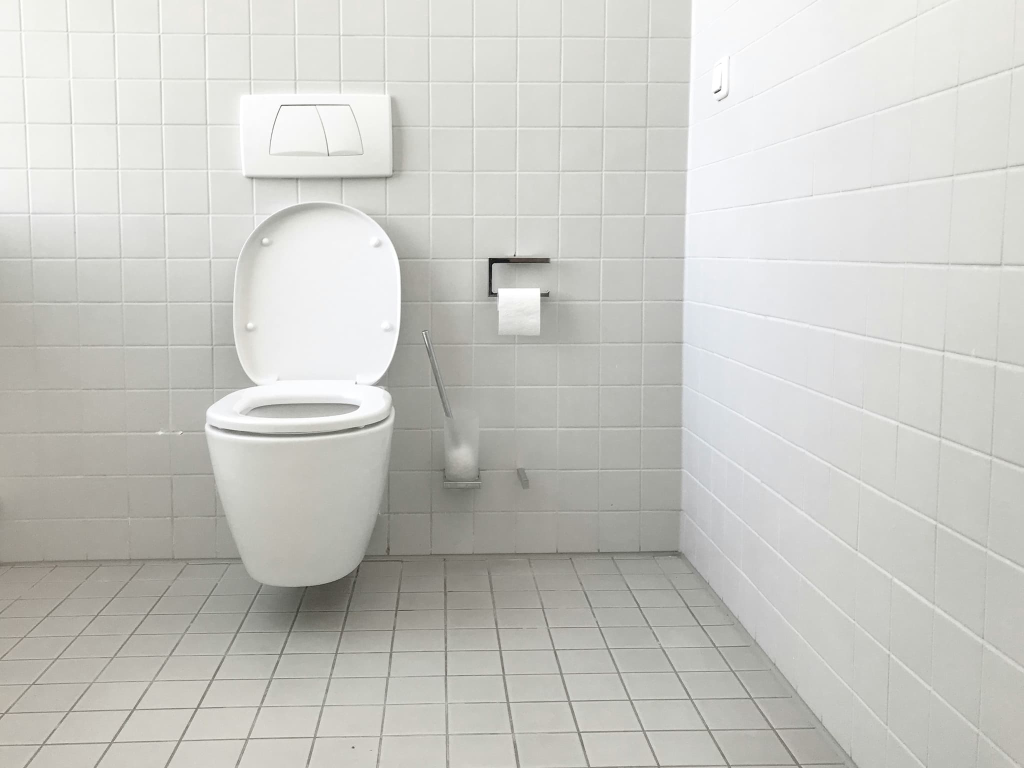 Comfort-height toilet and vanity with open access