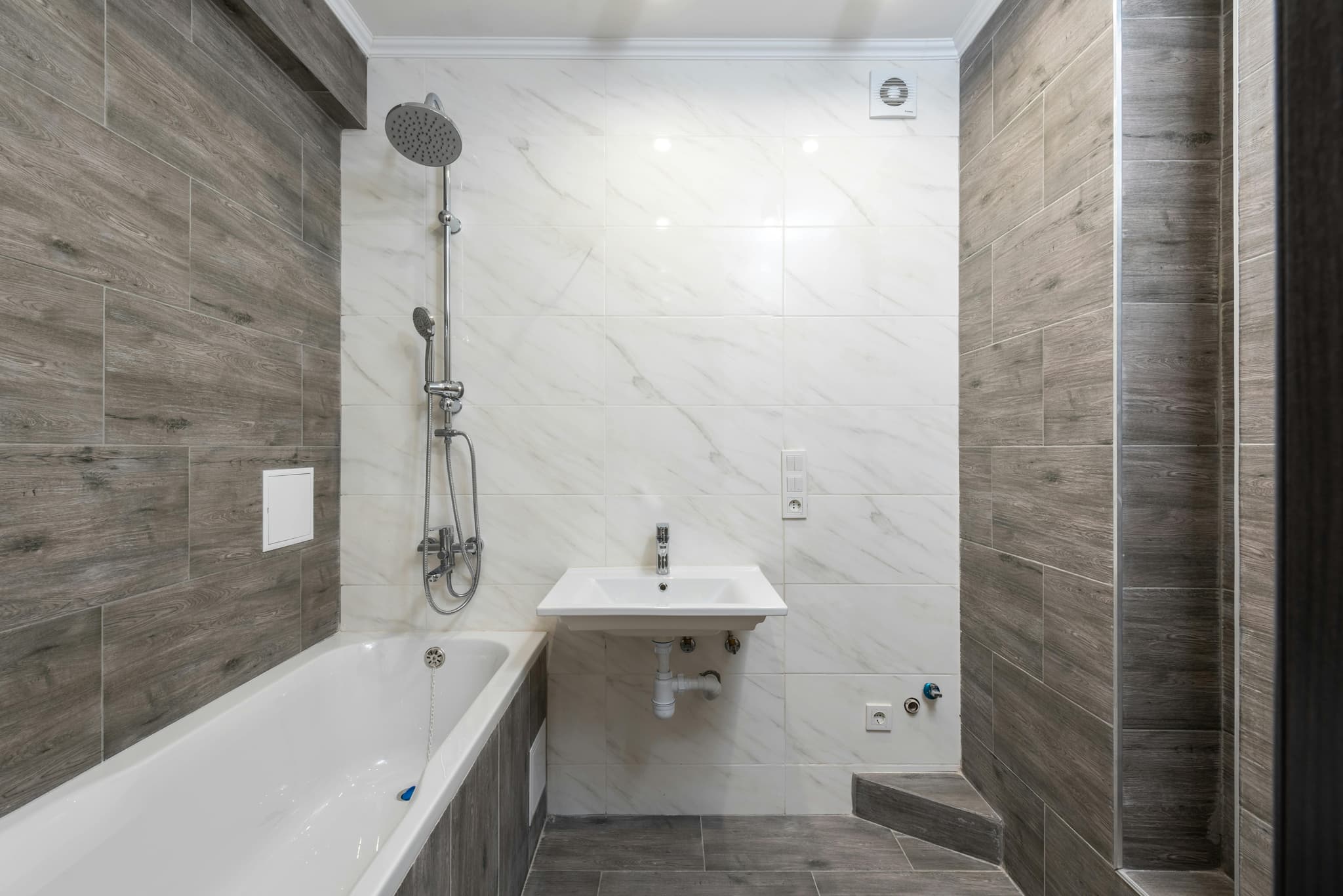 Affordable vanity and faucet in remodeled bathroom