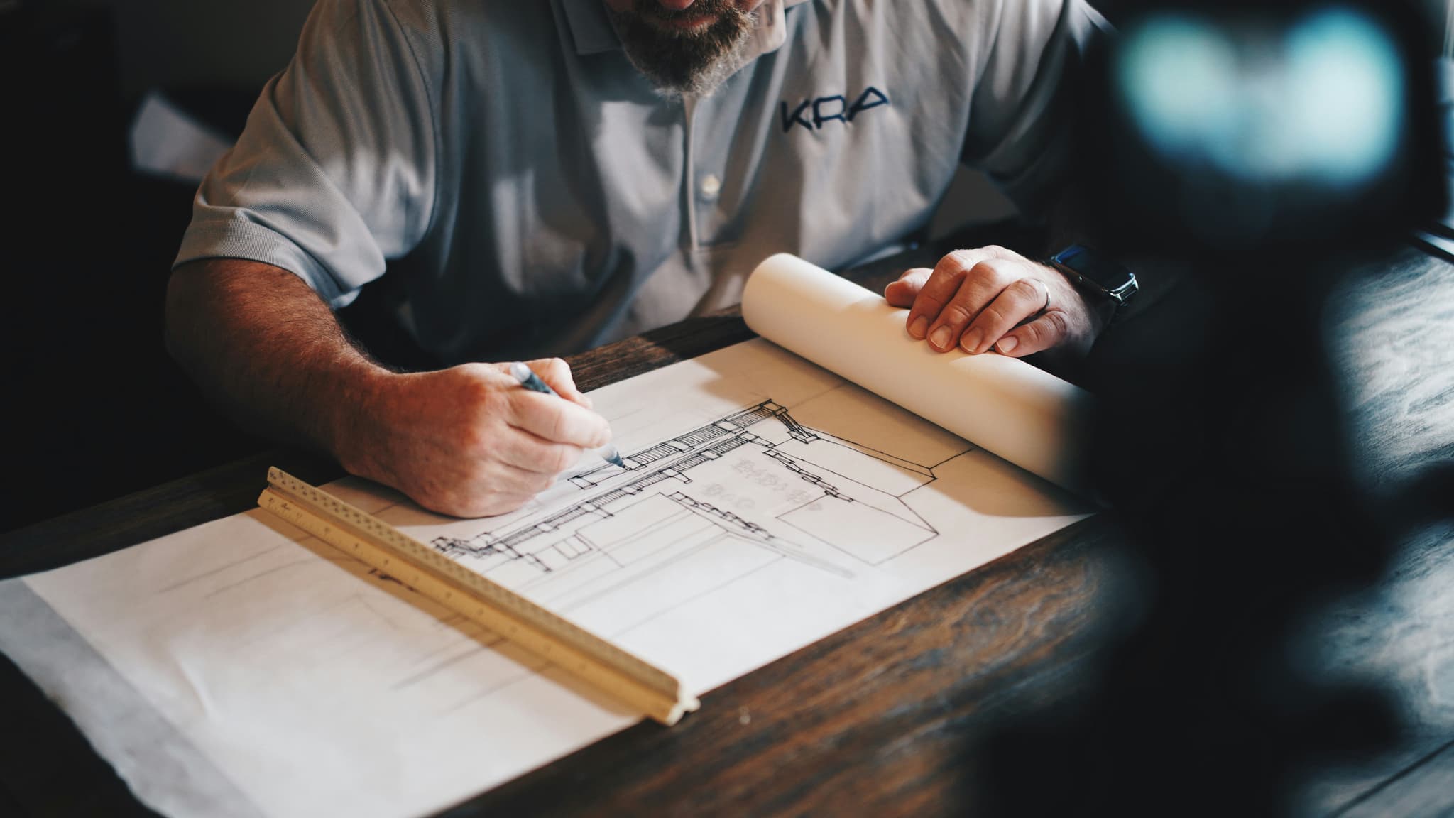 Permit documents and blueprint plans for shed construction