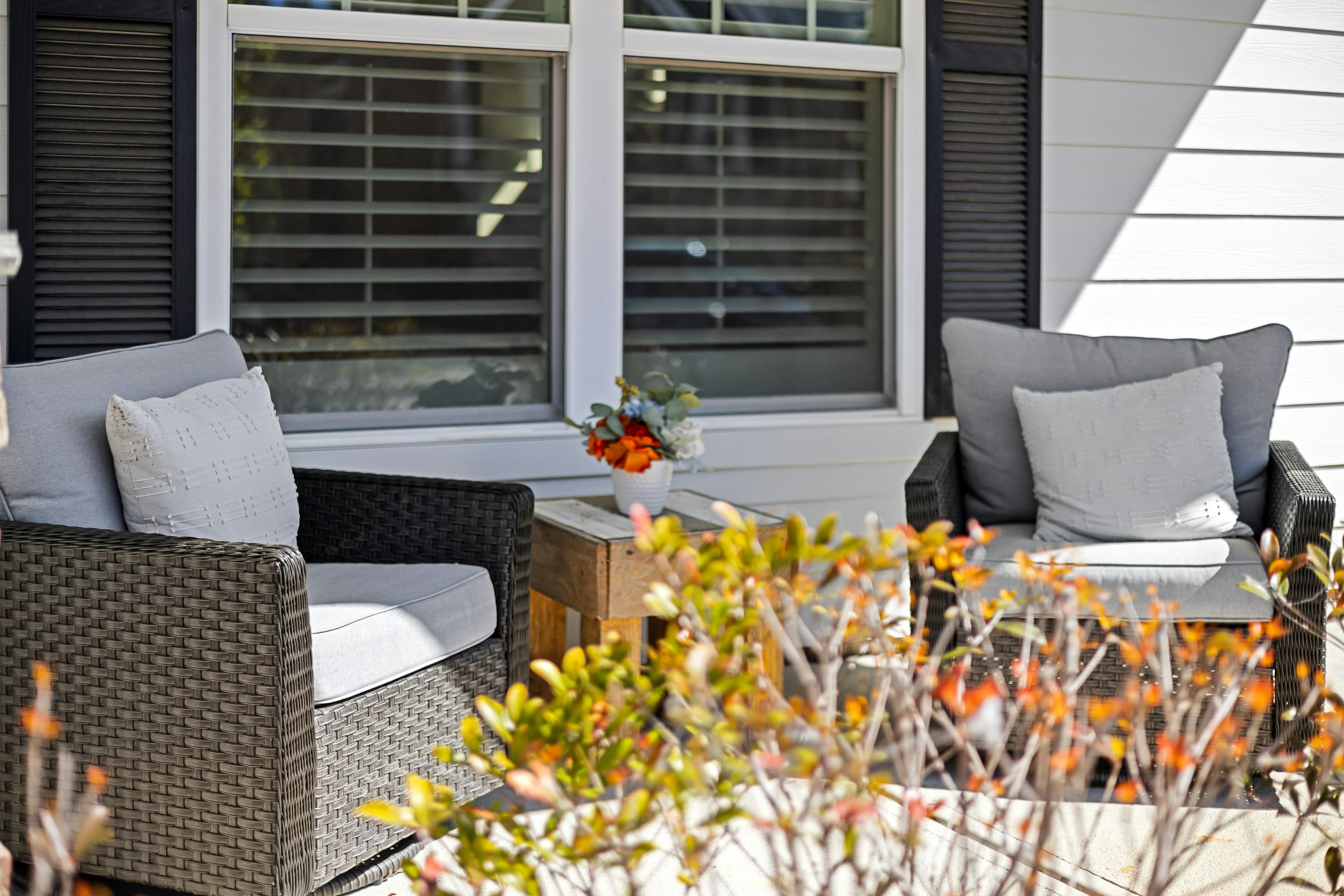 Outdoor lanai extension with seating and fans