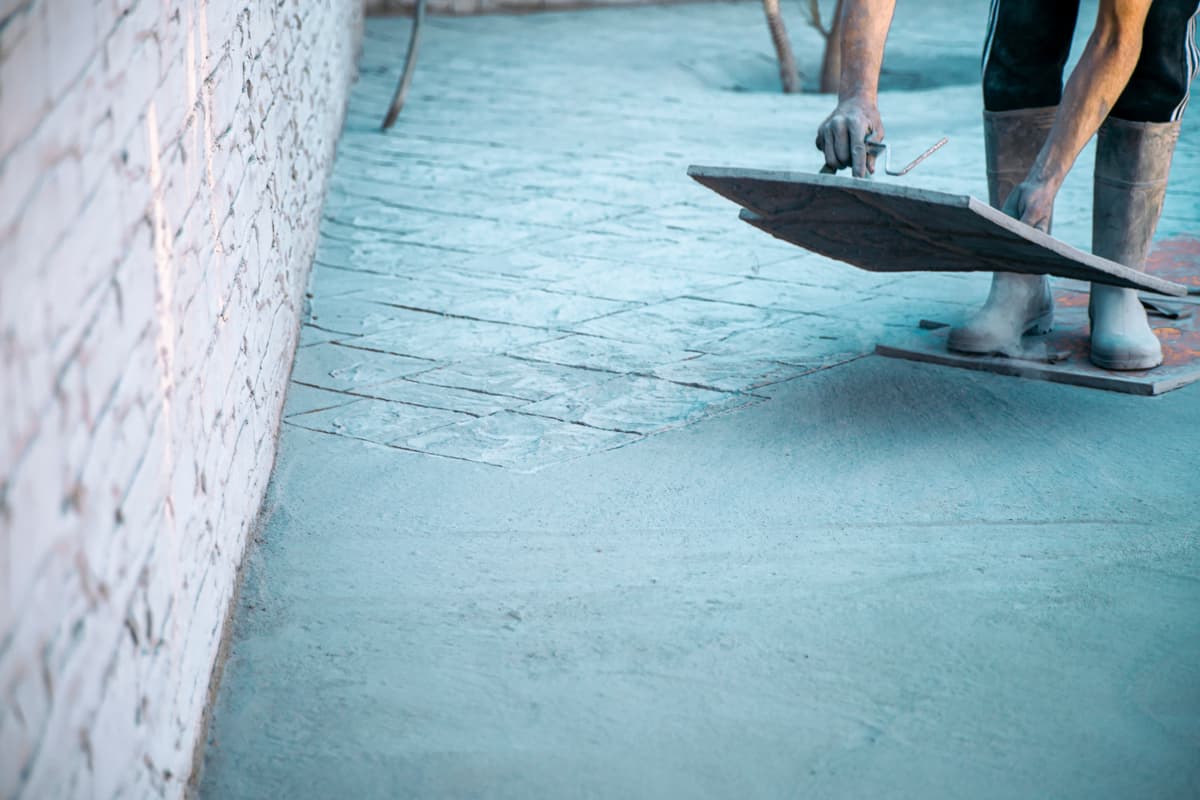 Concrete patio installation with forms and rebar